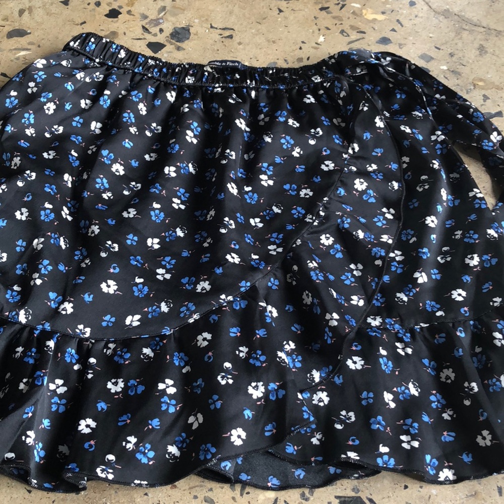 A black shirt with flowers. Abercrombie and Fitch